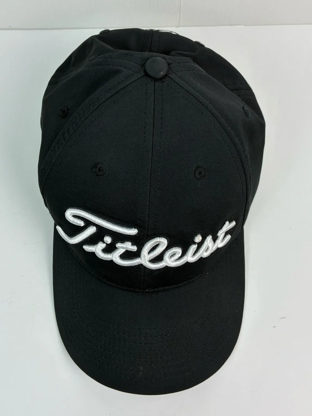 Titleist Tour Performance hat featuring embroidered Spectrum on the back OS
